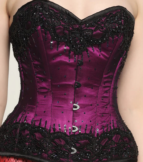 Leather bustiers for a bold and edgy look.Your Majesty Beaded Overbust Corset in Magenta